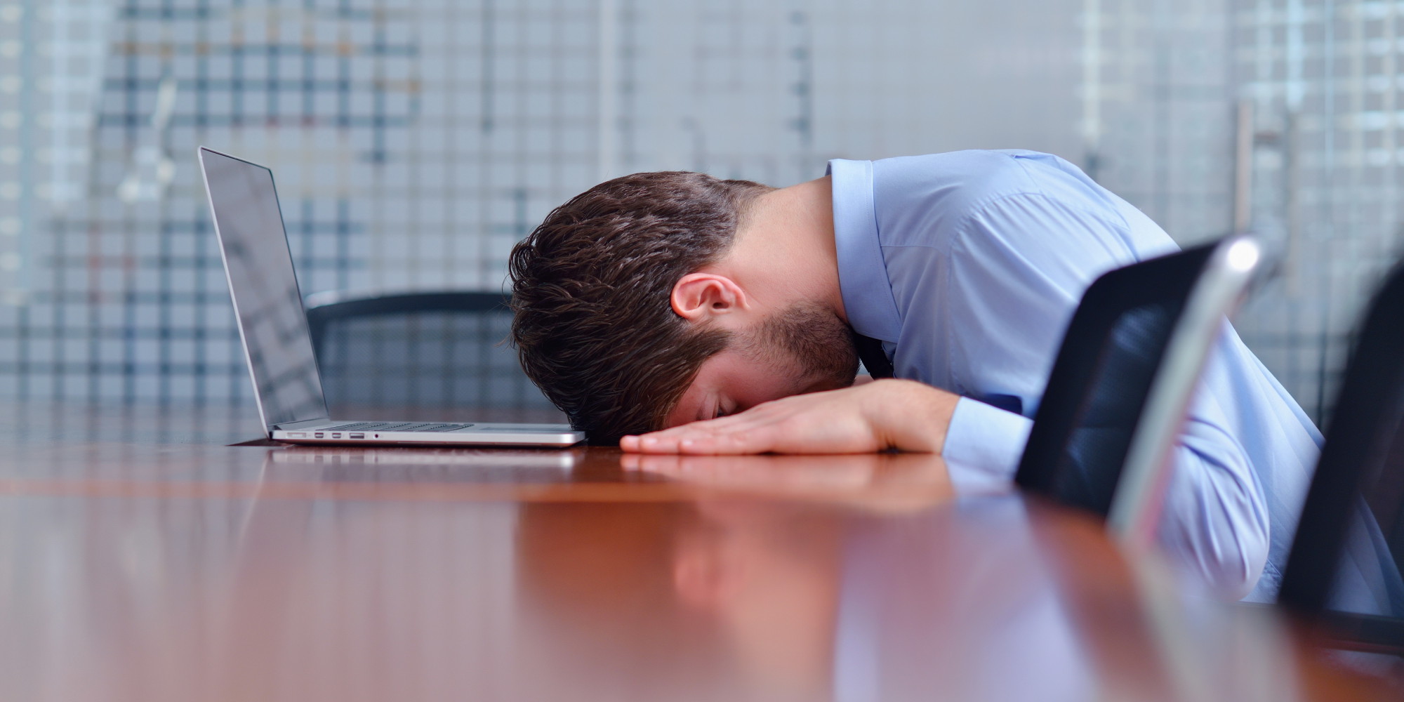 man exhausted office